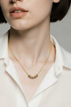 Collar de oro 10K con seminario en 3 oros