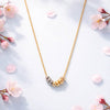 Collar de oro 10K con seminario en 3 oros