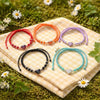 Cute Braided Heart Charm Bracelets made of Silver different colors