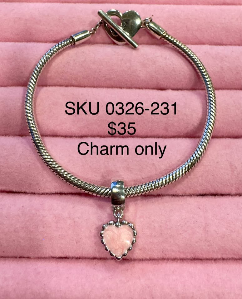 Cute pink heart dangle charm made of silver .925