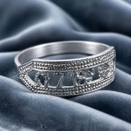 Silver tone cut-out design ring of luck silver .925