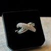 Anillo Trenzado con microcirconias con bano de rodio talla 6 y 9