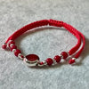 PULSERA AJUSTABLE DE HILO ROJO CON AGATAS, PLATA .925