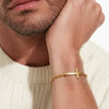 PULSERA CON CRUZ LISA CON BAÑO DE ORO, PLATA .925