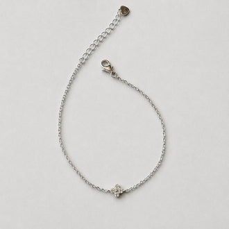PULSERA CON DIJE MULTICIRCONIAS, BANO DE RODIO, CR
