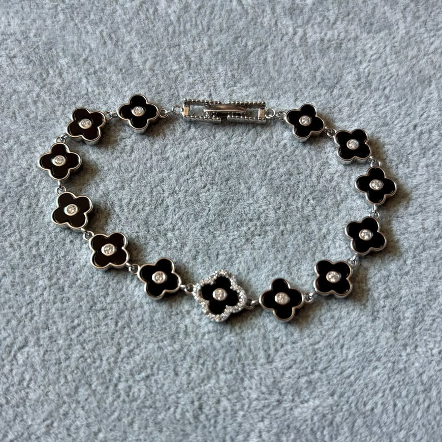 PULSERA NEGRA CON BANO DE RODIO, PLATA