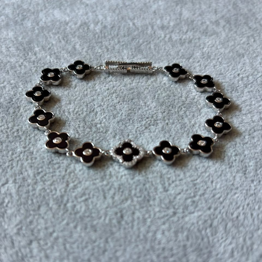 PULSERA NEGRA CON BANO DE RODIO, PLATA