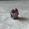 Charm regalo con mono rosa