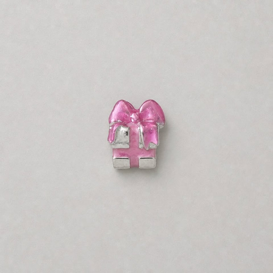 Charm regalo con mono rosa