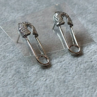 Arete de broches/seguros