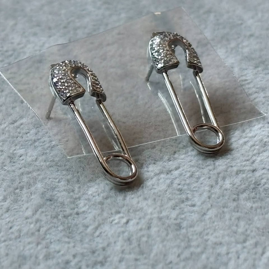 Arete de broches/seguros