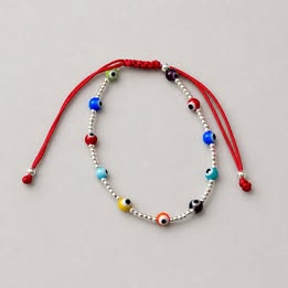 PULSERA AJUSTABLE HILO ROJO BOLITAS LISAS CON OJITO MULTICOLOR, PLATA .925