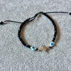Pulsera con cristal negro y nudo de bruja Plata