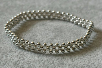 Pulsera tejida con bolitas lisas, Plata .925