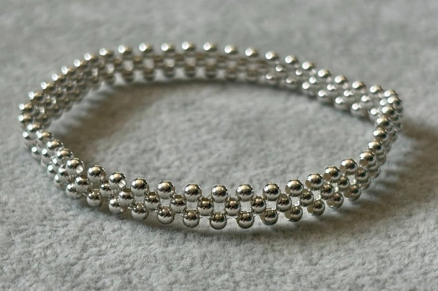 Pulsera tejida con bolitas lisas, Plata .925