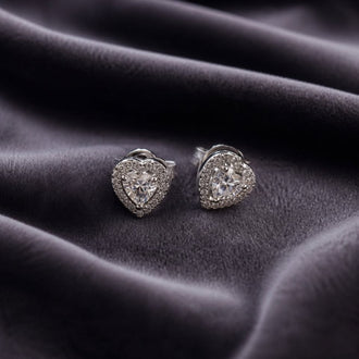 ARETE DE CORAZON CON BISEL DE CIRCONIAS, BAÑO DE RODIO, PLATA .925