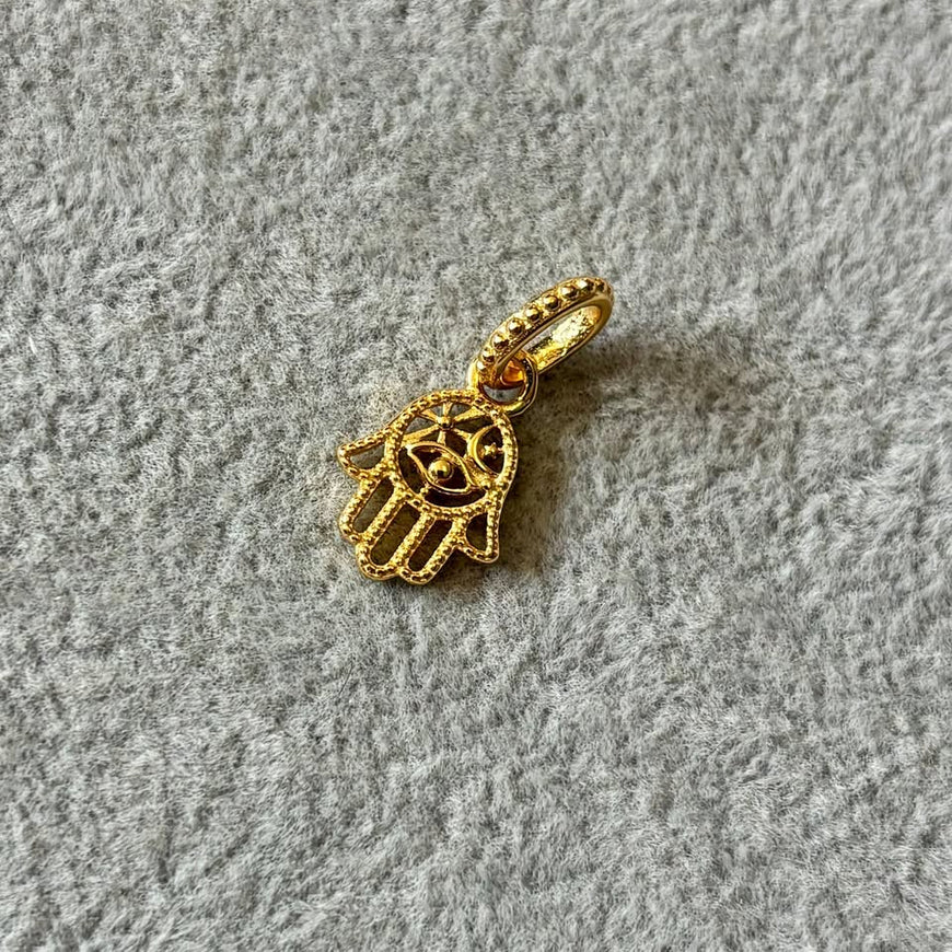 Dije de mano de fatima bano de oro , plata .925