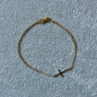 Pulsera Esclavo con dije de cruz lisa, oro 14k