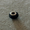 Charm/Dije llantita con zirconia negra