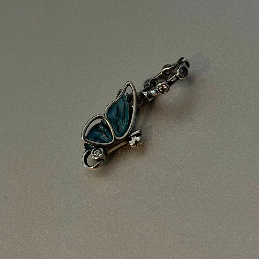 Charm mariposa azul