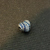 Charm de corazon con piedras azules