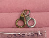 Gold and Silver Charm Esposas