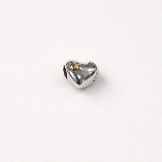 Silver charm heart with gold love struck design