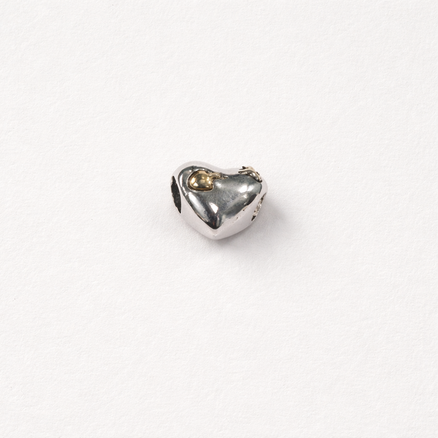 Silver charm heart with gold love struck design