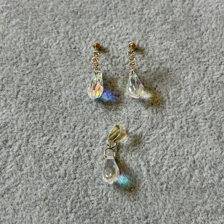 Dije y aretes de gota tornasol oro 10K