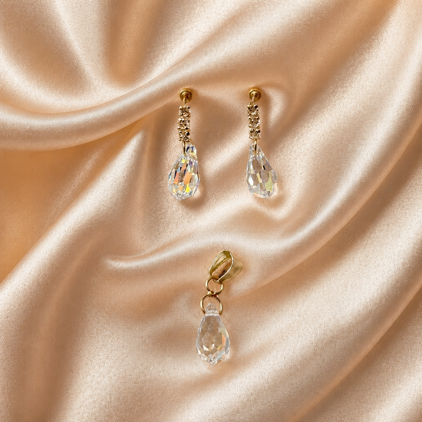 Dije y aretes de gota tornasol oro 10K