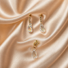 Dije y aretes de gota tornasol oro 10K
