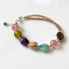 Pulsera con piedras naturales color negro, roja, verde, naranja, amtista, multicolor. Plata .925