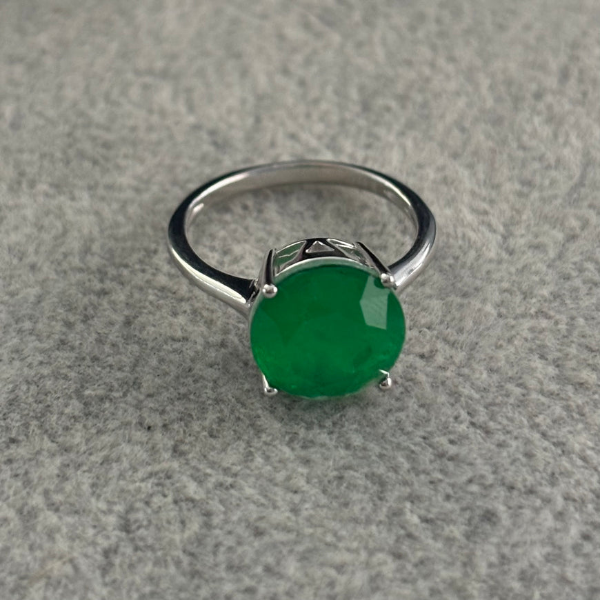 ANILLO CON PIEDRA PARAIBA REDONDA DISENO AL AZAR, TALLA 5,6,8,9 CON BANO DE RODIO