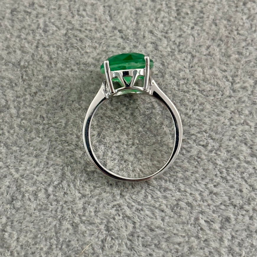ANILLO CON PIEDRA PARAIBA REDONDA DISENO AL AZAR, TALLA 5,6,8,9 CON BANO DE RODIO