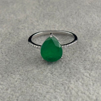 ANILLO CON PIEDRA PARAIBA GOTA DISENO AL AZAR, ELIGEN TALLA 5,6,7,8,9, CON BANO DE RODIO