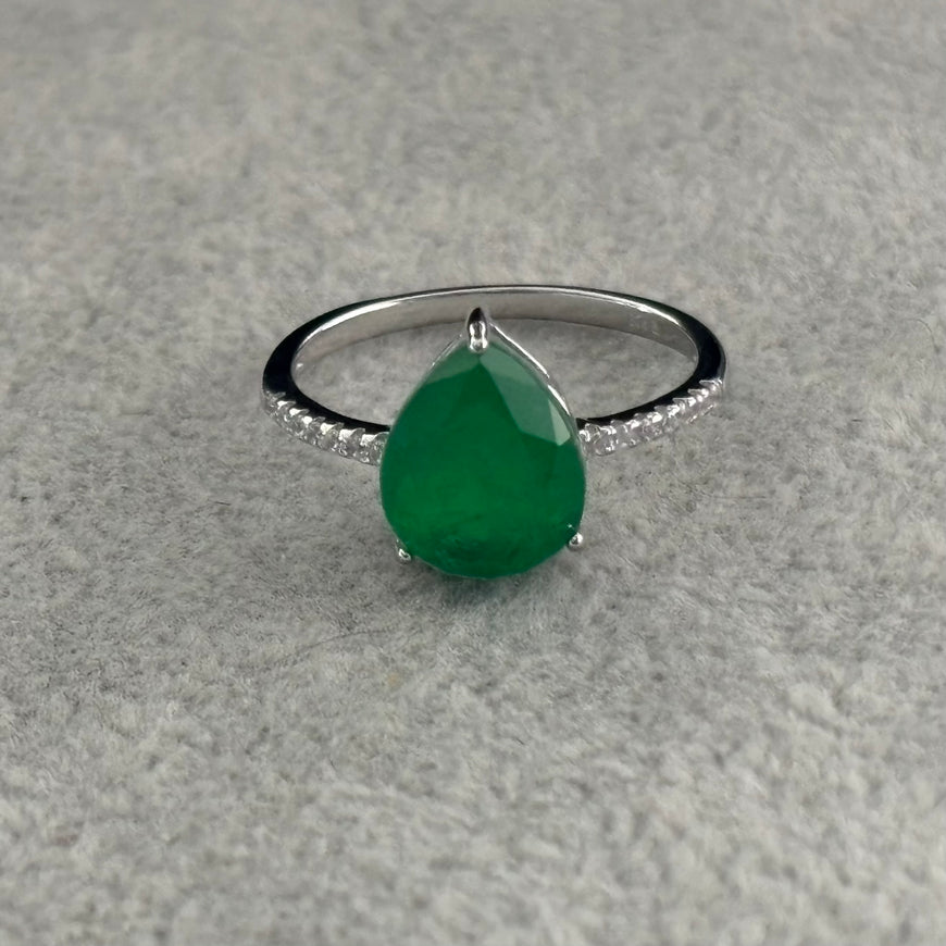 ANILLO CON PIEDRA PARAIBA GOTA DISENO AL AZAR, ELIGEN TALLA 5,6,7,8,9, CON BANO DE RODIO
