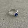 ANILLO CON CIRCONIA AZUL TALLA 5,7,9
