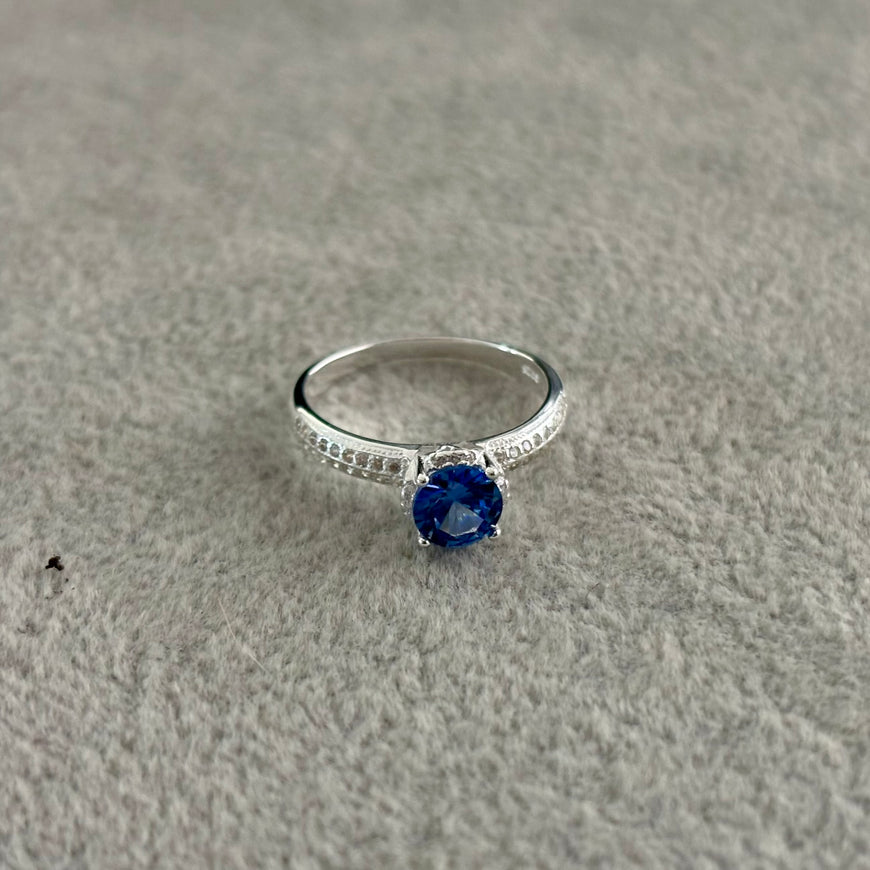 ANILLO CON CIRCONIA AZUL TALLA 5,7,9