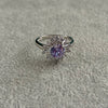 ANILLO CON CIRCONIAS BLANCAS Y DISENO LILA 7,8,9