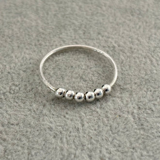 ANILLO BOLITAS TALLA 7, 10