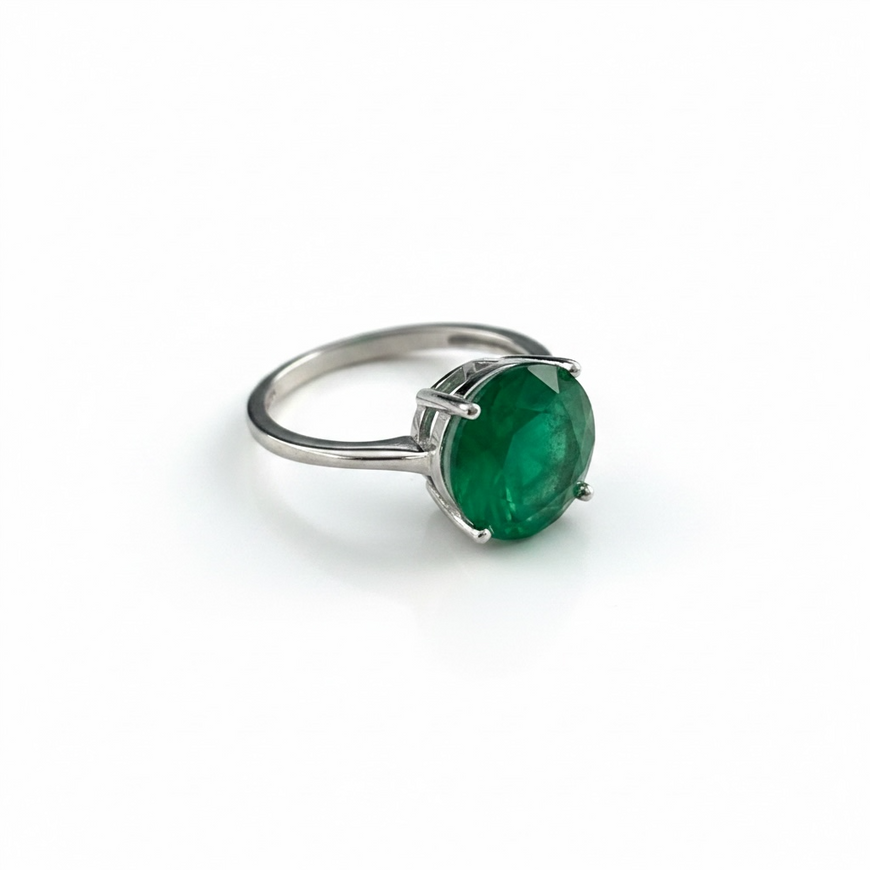 ANILLO CON PIEDRA PARAIBA REDONDA DISENO AL AZAR, TALLA 5,6,8,9 CON BANO DE RODIO