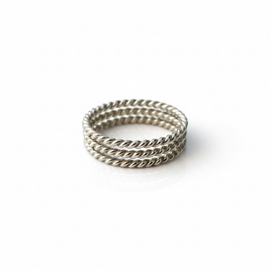 Anillo pare el piel con tres disenos torzal Plata .925 Talla 4
